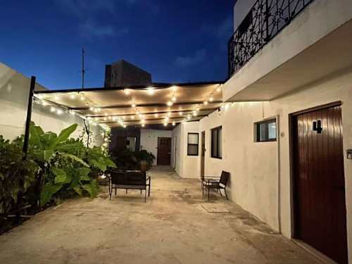 Shared common area and entrance walkway (evening view)