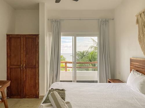 Private bedroom with king bed and natural light