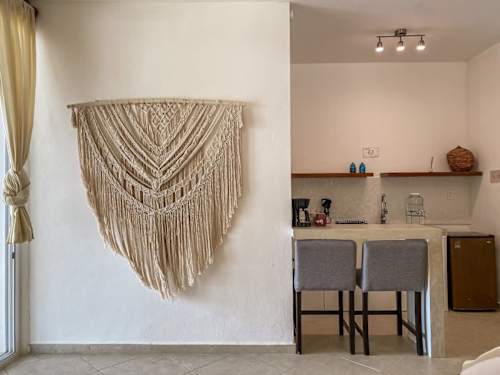Kitchen bar area with handcrafted macrame decor