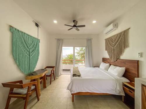 King bedroom with bright natural light