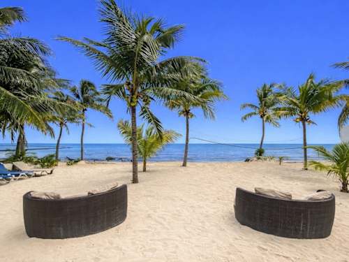 Shared beach lounge seating by the sea