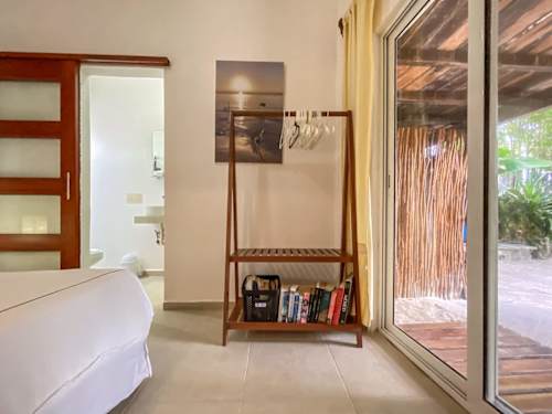 Studio interior with sliding door to private terrace