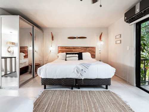 Bright bedroom with king bed and natural light