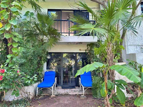 Shared garden with lounge chairs