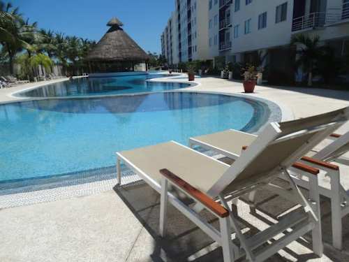 Shared pool with sun loungers
