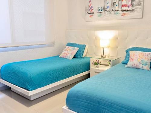 Bedroom with blackout blinds and bright decor