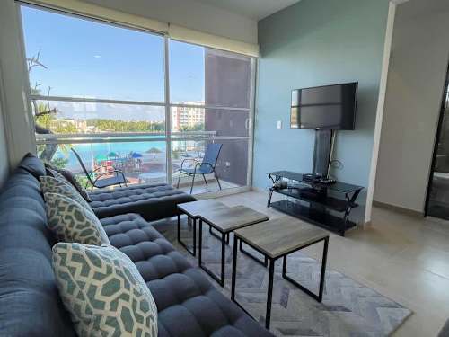 Living room with lagoon views and Smart TV