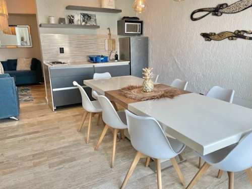 Dining area seating eight guests