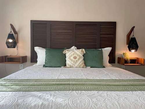 King-size bed with fresh linens.