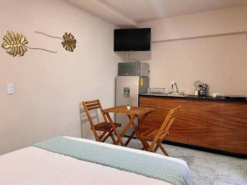 Cozy studio with bistro dining set