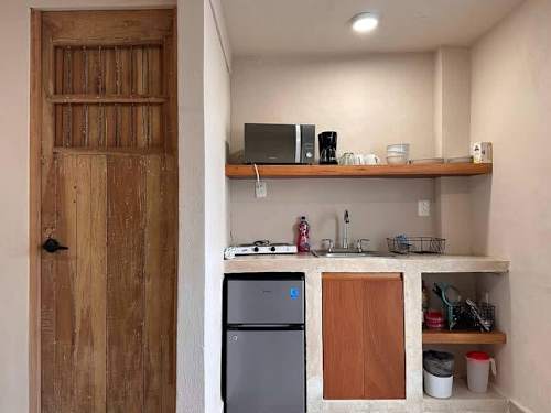 Equipped kitchenette with the basics.