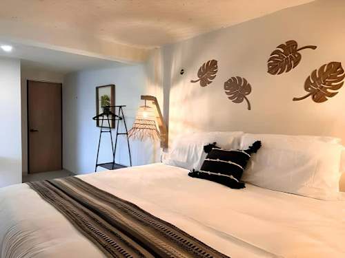 Sleeping area with Smart TV and local decor