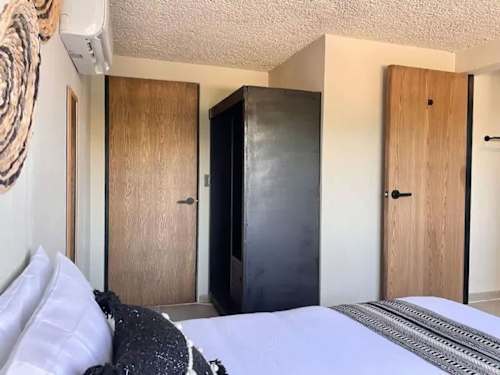 Built-in wardrobe and storage in the studio