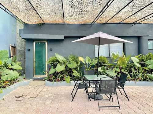 Shared outdoor patio with seating to relax