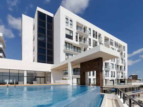 Beachfront condominium building exterior (shared)