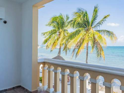 Private balcony with palm and ocean views