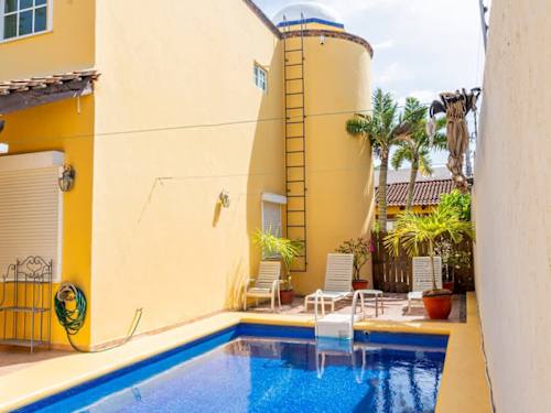 Private swimming pool with patio