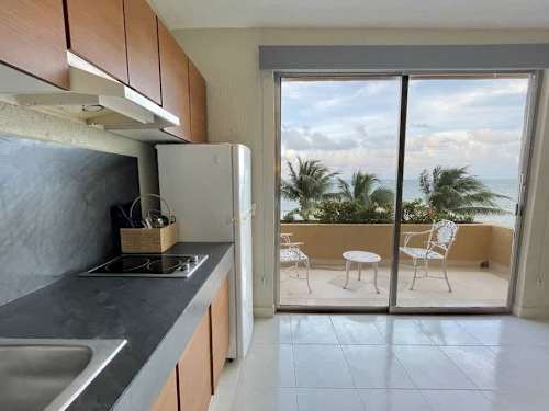Balcony with sliding doors and ocean views