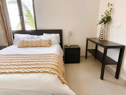 Bedroom with double bed and workspace