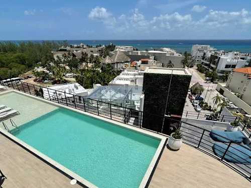 Shared rooftop pool with panoramic views