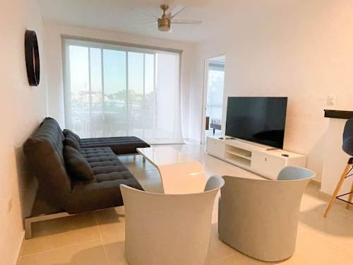 Living area with 65" smart TV