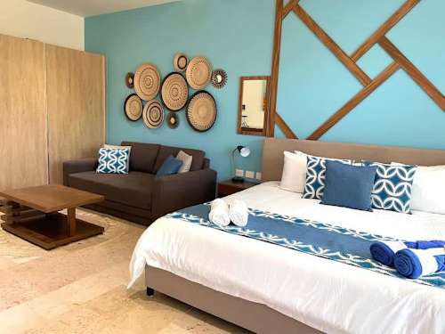 King bed with plush linens