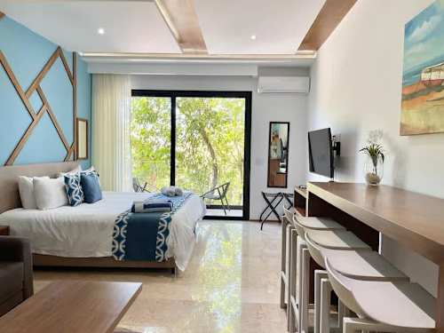 Studio interior with fully equipped kitchenette