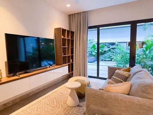 Living room with electric blackout curtains