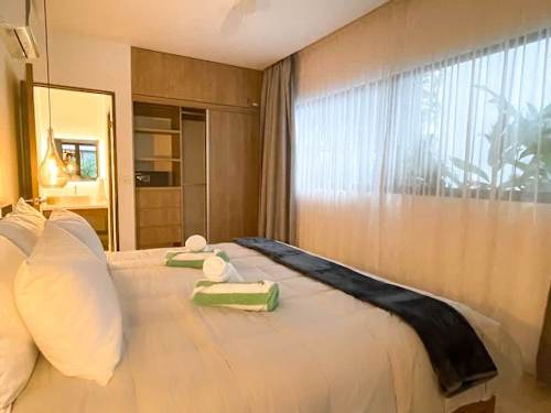 Bedroom with electric blackout curtains