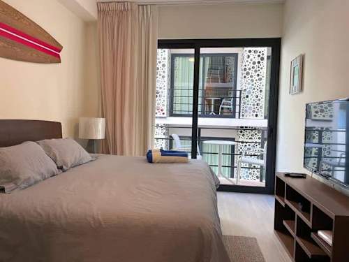 Bedroom with King bed and natural light