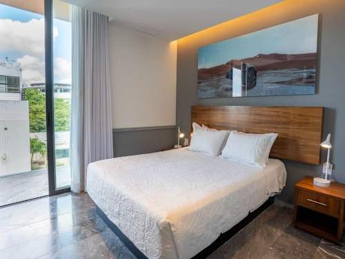 Bedroom with king bed and smart TV