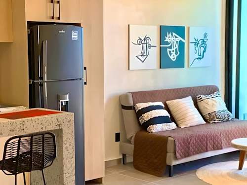 Fully equipped kitchen with refrigerator