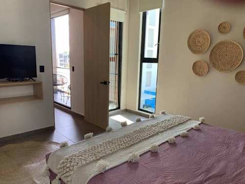Bedroom with balcony access