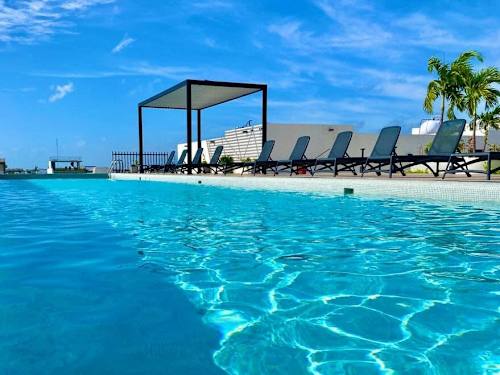 Shared pool with sun loungers