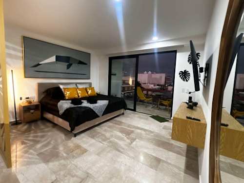 King-size bed with designer accent wall (private studio)