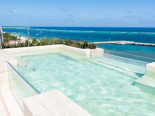 Rooftop infinity pool with ocean views