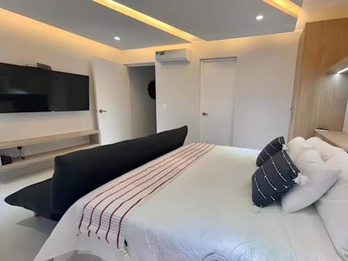 King-size bed with air conditioning
