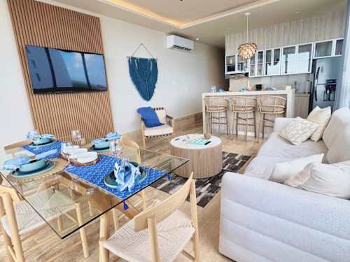 Open living and dining area with ocean views