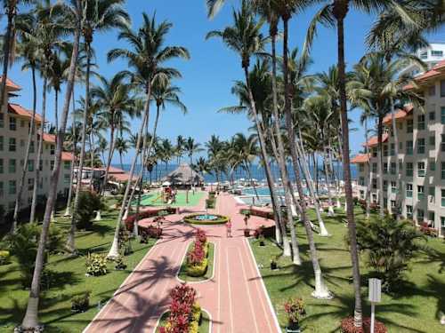 Shared resort grounds and beach path