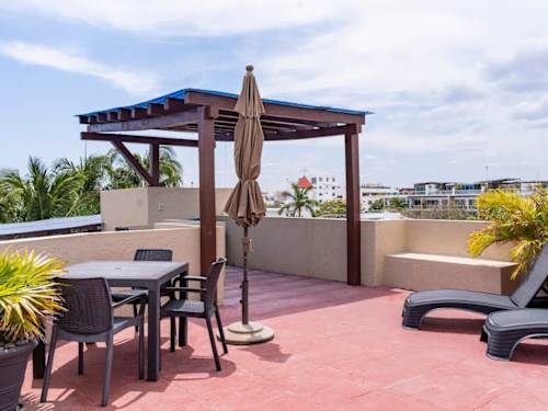 Shared rooftop dining area with city view
