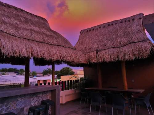 Shared rooftop terrace at sunset