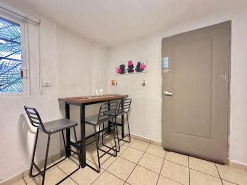 Kitchen and dining area with breakfast bar