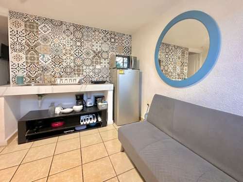 Open kitchen and dining space in the studio
