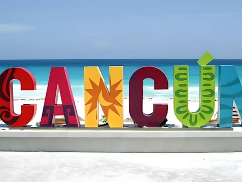 Nearby: iconic Cancun sign