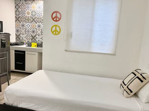 Studio with beds and kitchenette