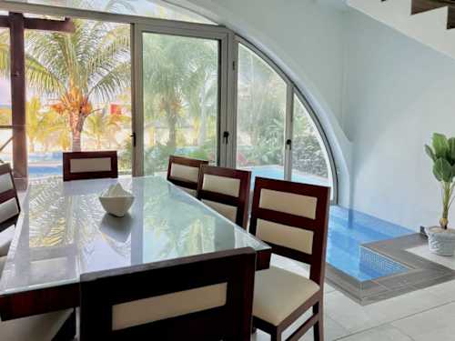 Dining area seating 8 with ceiling fan