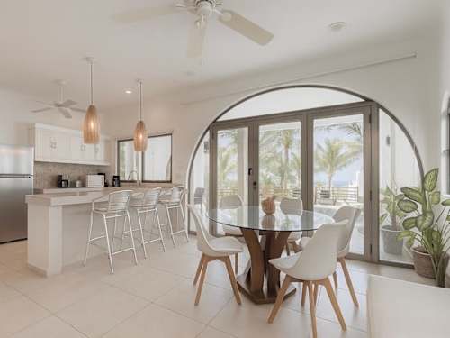 Light-filled interior with floor-to-ceiling glass