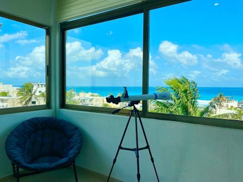 Private balcony seating with ocean view