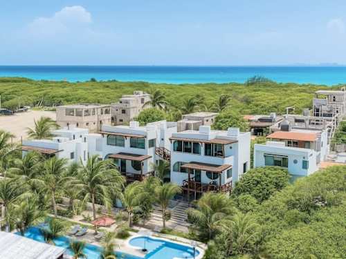 Aerial view of the shared condominium pool
