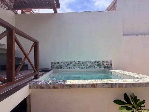 Private plunge pool set into a tiled terrace, a cool and intimate spot to soak away the afternoon